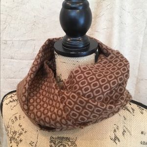 100% Cashmere. Made in Scotland.  Brown and Tan.